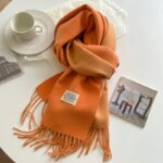 Écharpe chaude orange à franges saison automne hiver